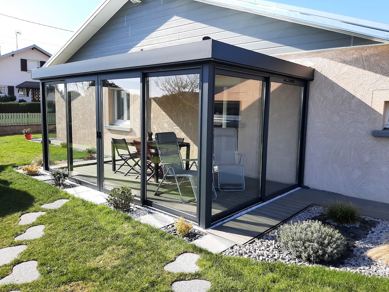 Véranda en aluminium ou en bois : quel matériau choisir pour votre extension ?